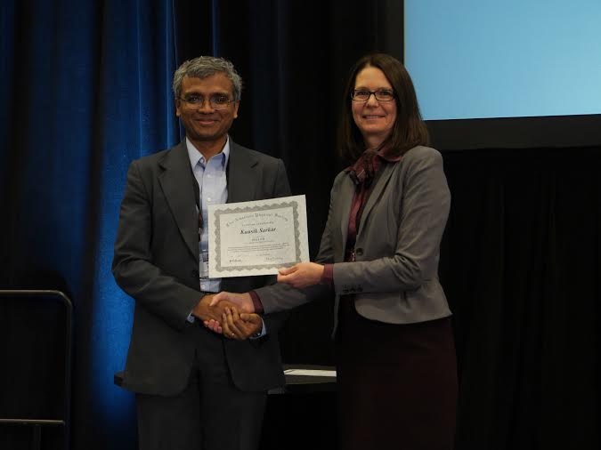 Photo of Professor Sarkar receiving an award
